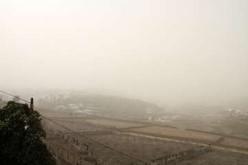 Una densa calima cubre el cielo de Telde (Foto Jesús Ruiz, TA y Antonio Rico)